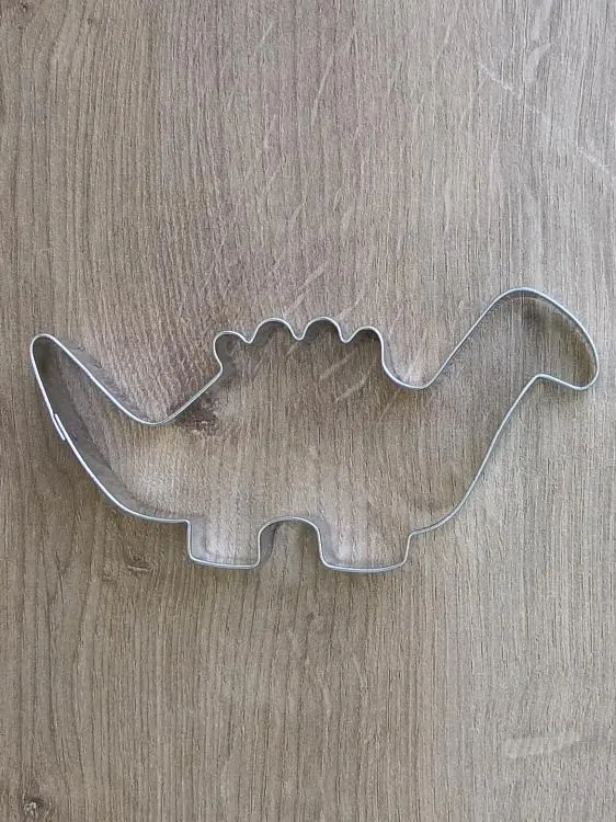 Pocínované vykrajovátko na těsto ve tvaru dinosaura